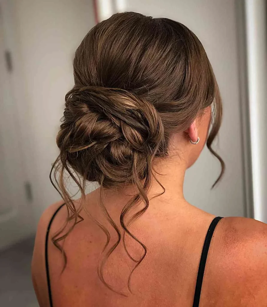 modern prom updo with wavy pieces for long hair 1